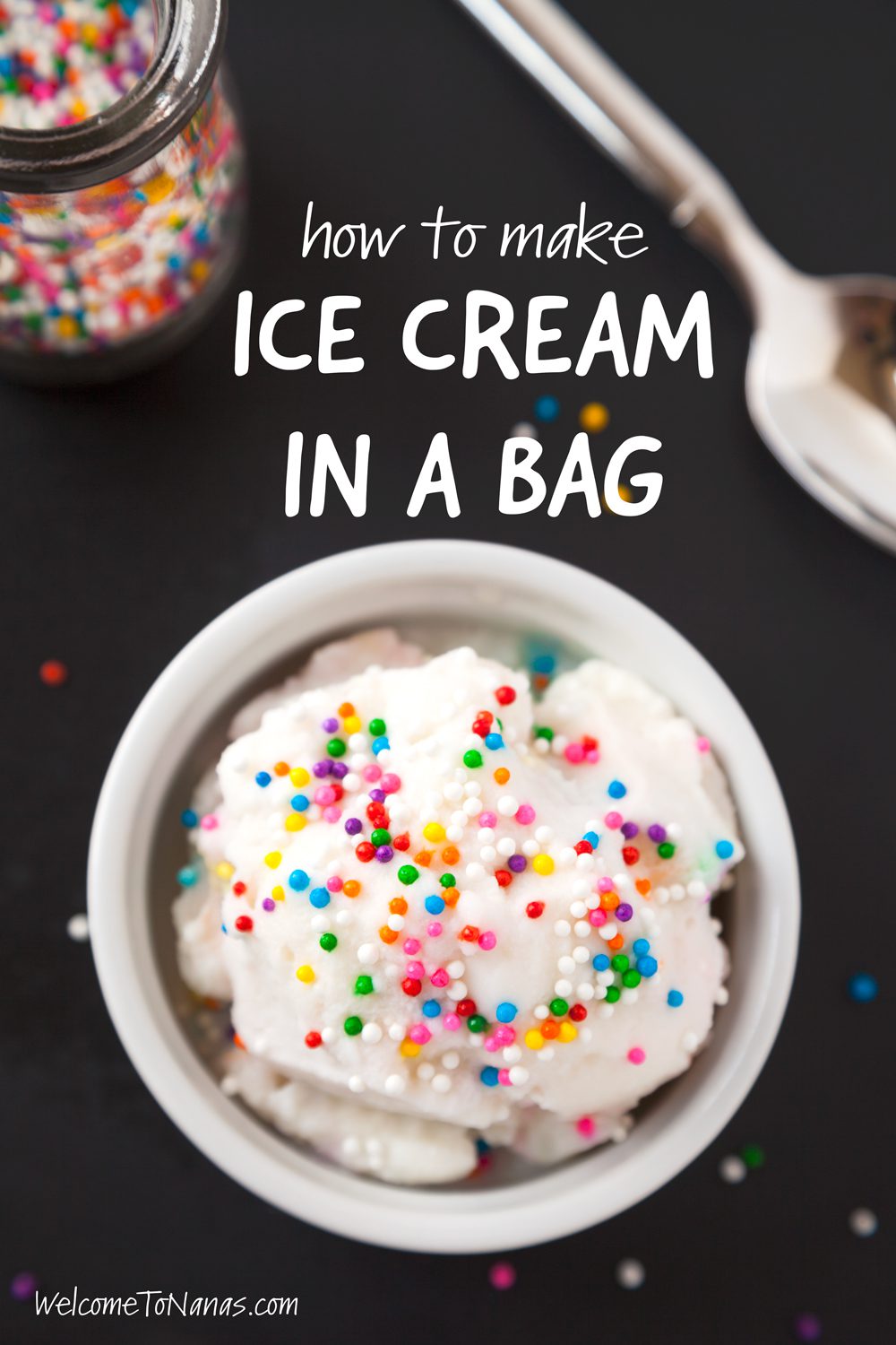 A bowl of Ice Cream made in a bag with sprinkles on top, a jar of sprinkles to the side.
