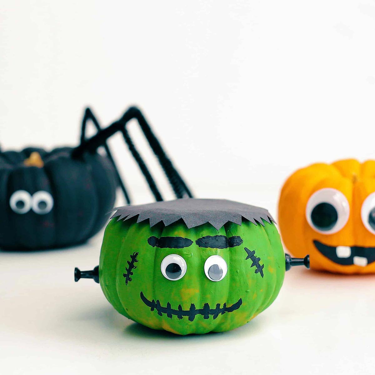 Frankenstein mini pumpkin, silly face pumpkin, spider pumpkin.