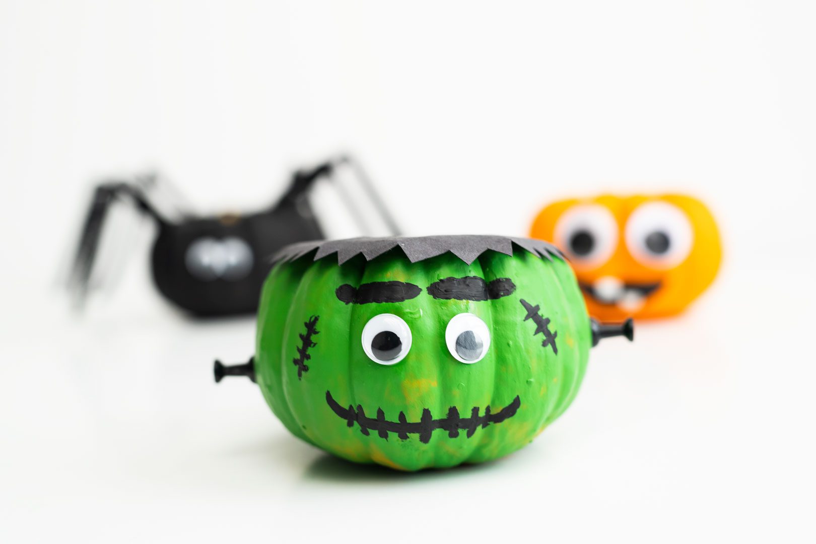 Frankenstein mini pumpkin, silly face pumpkin, spider pumpkin.