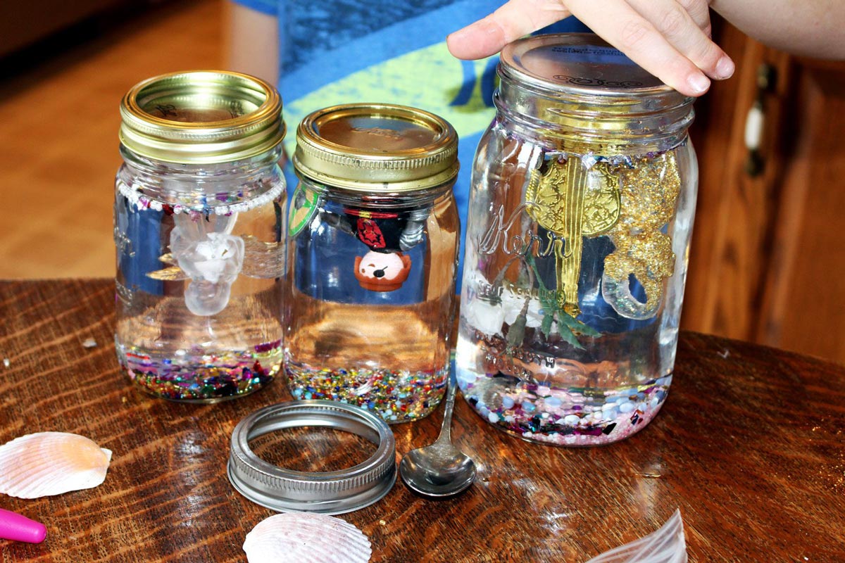 Final finished DIY snow globes, waiting to dry.