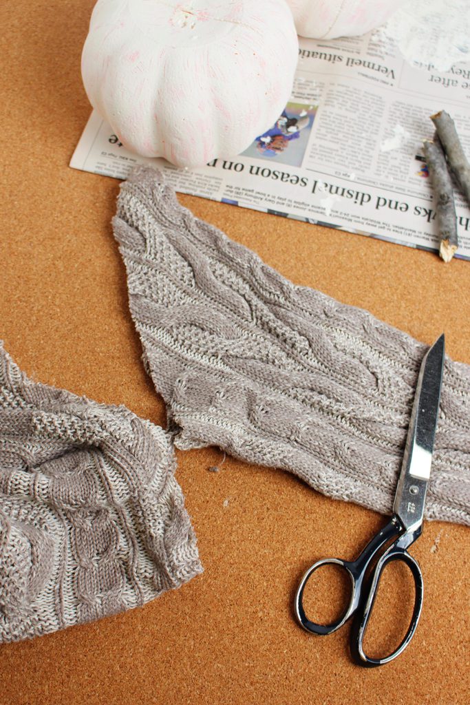 Cut off the sleeve of an upcycled sweater. | Welcome to Nana's #WelcometoNanas #Easy #DIY #Pumpkin #Decorations #Sweater #Recycled #Upcycled #Craft