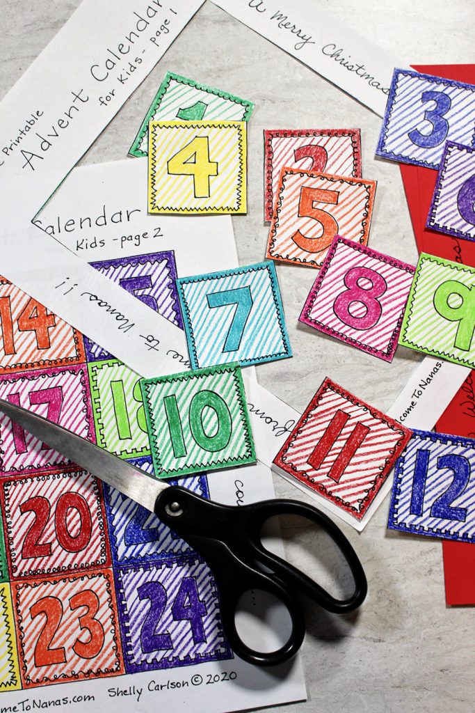 Scissors and decorated advent calendar numbers