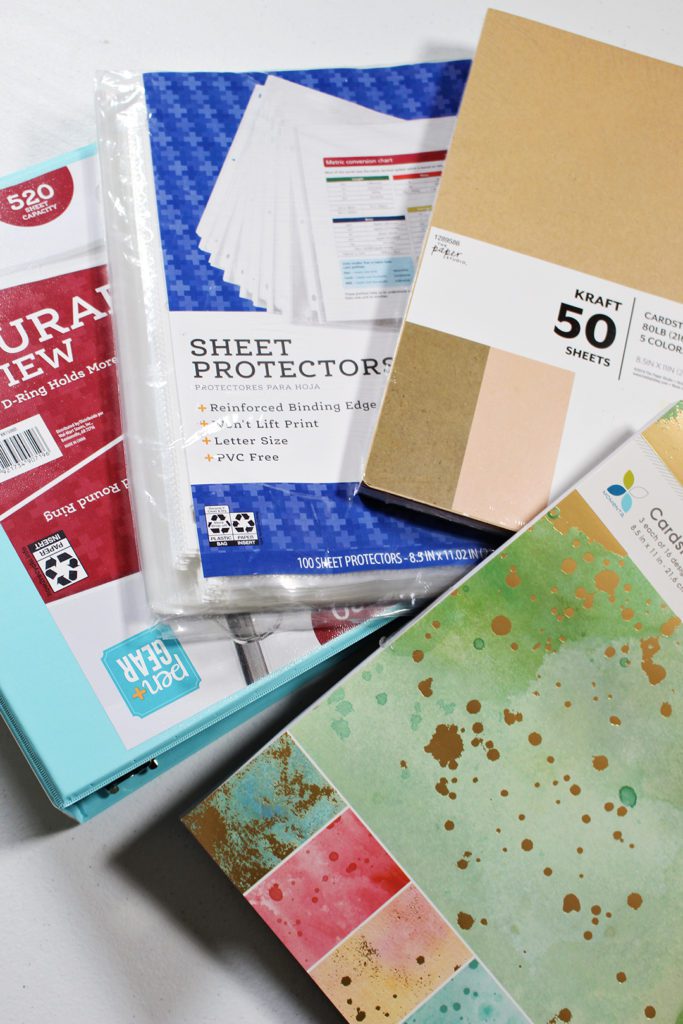 Sheet protectors, scrapbook paper, cardstock and a folder.