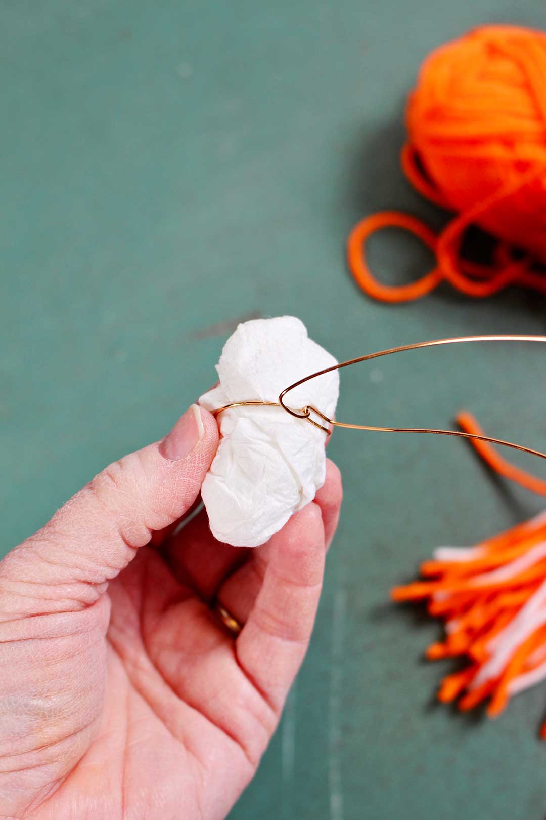 Copper wire wrapped around a ball of paper towels