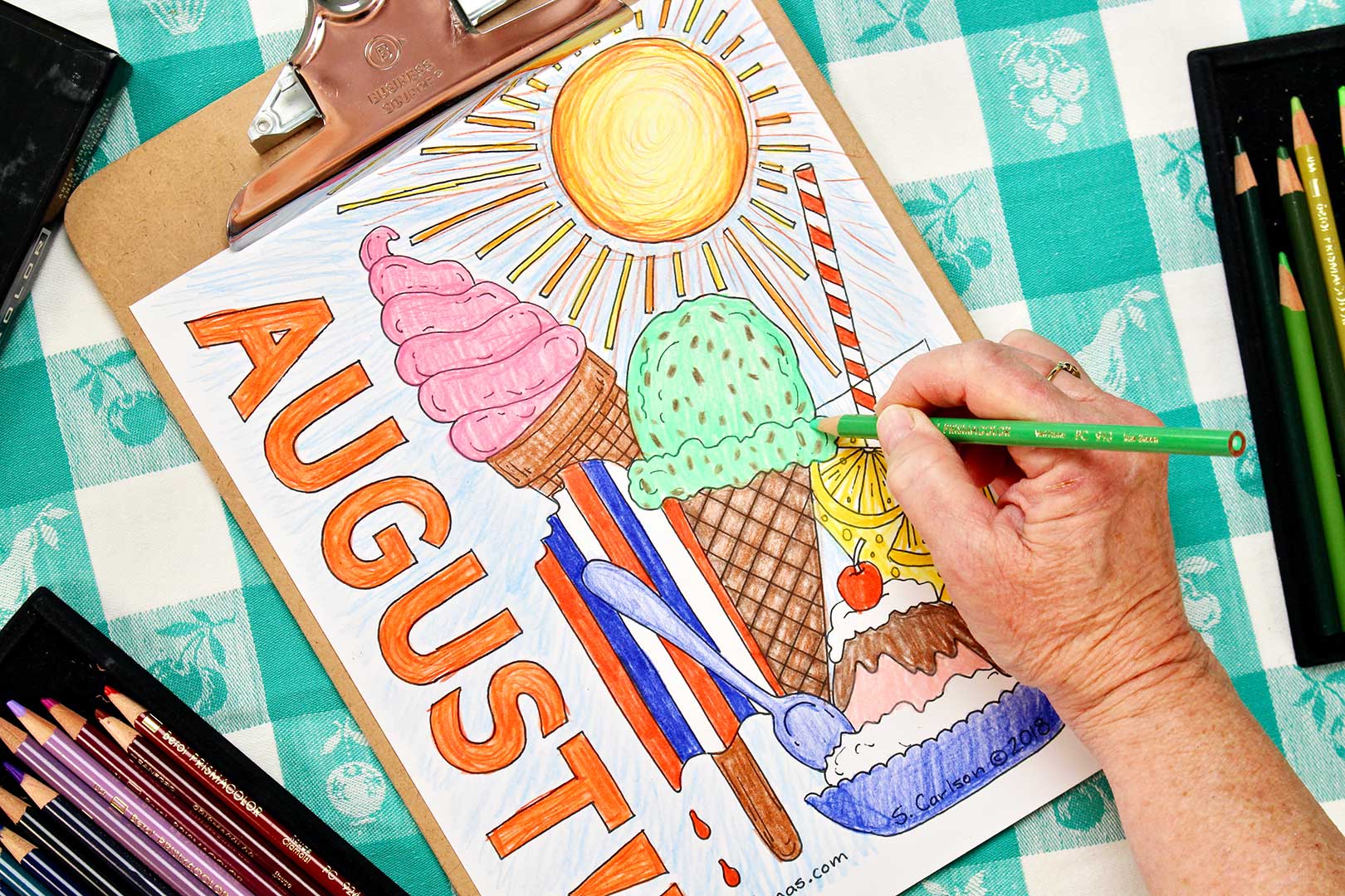 Hand coloring an ice cream cone on August coloring sheet.