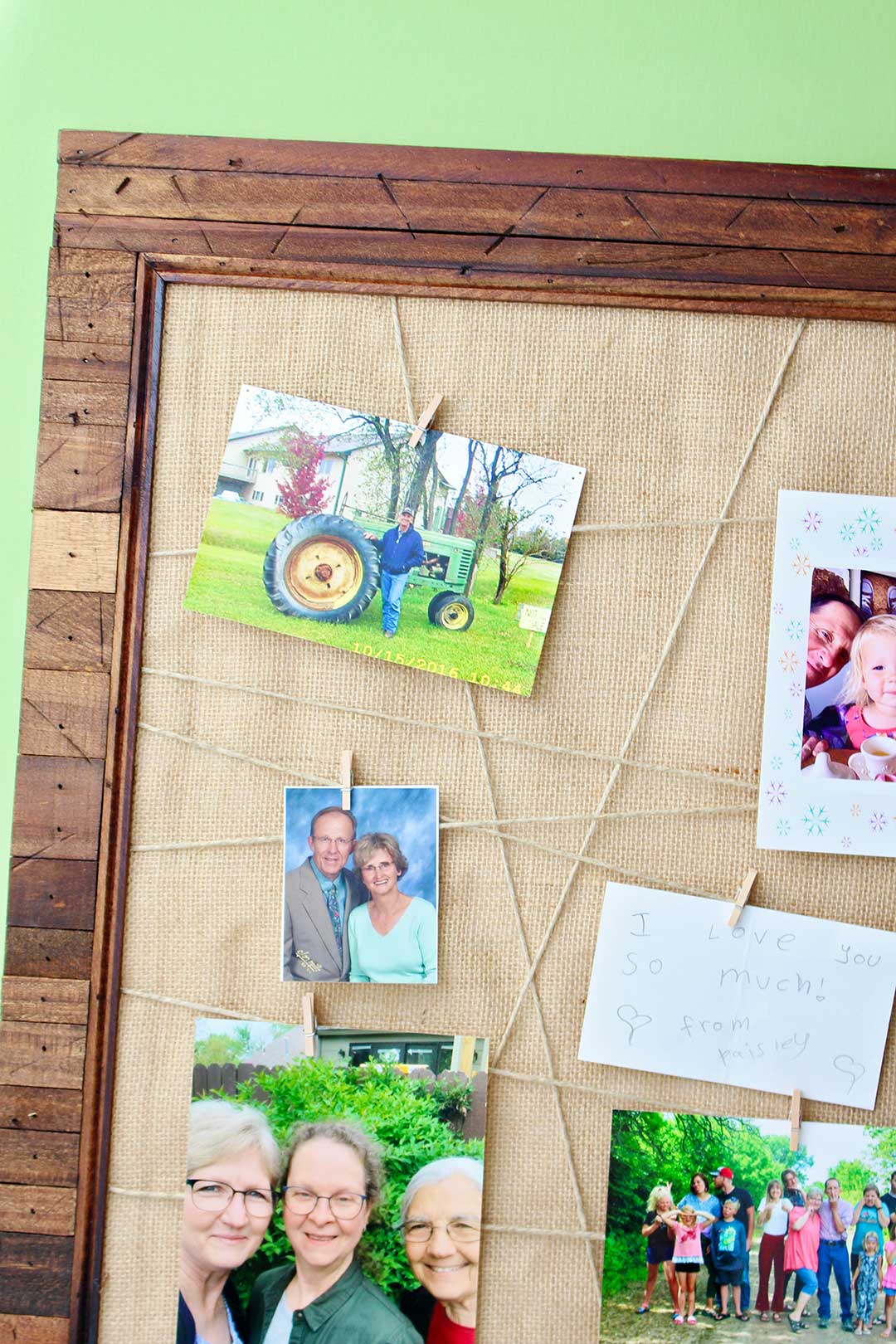 Close up view of completed Upcycled Photo Frame with criss crossed twine, photos and a burlap backing.