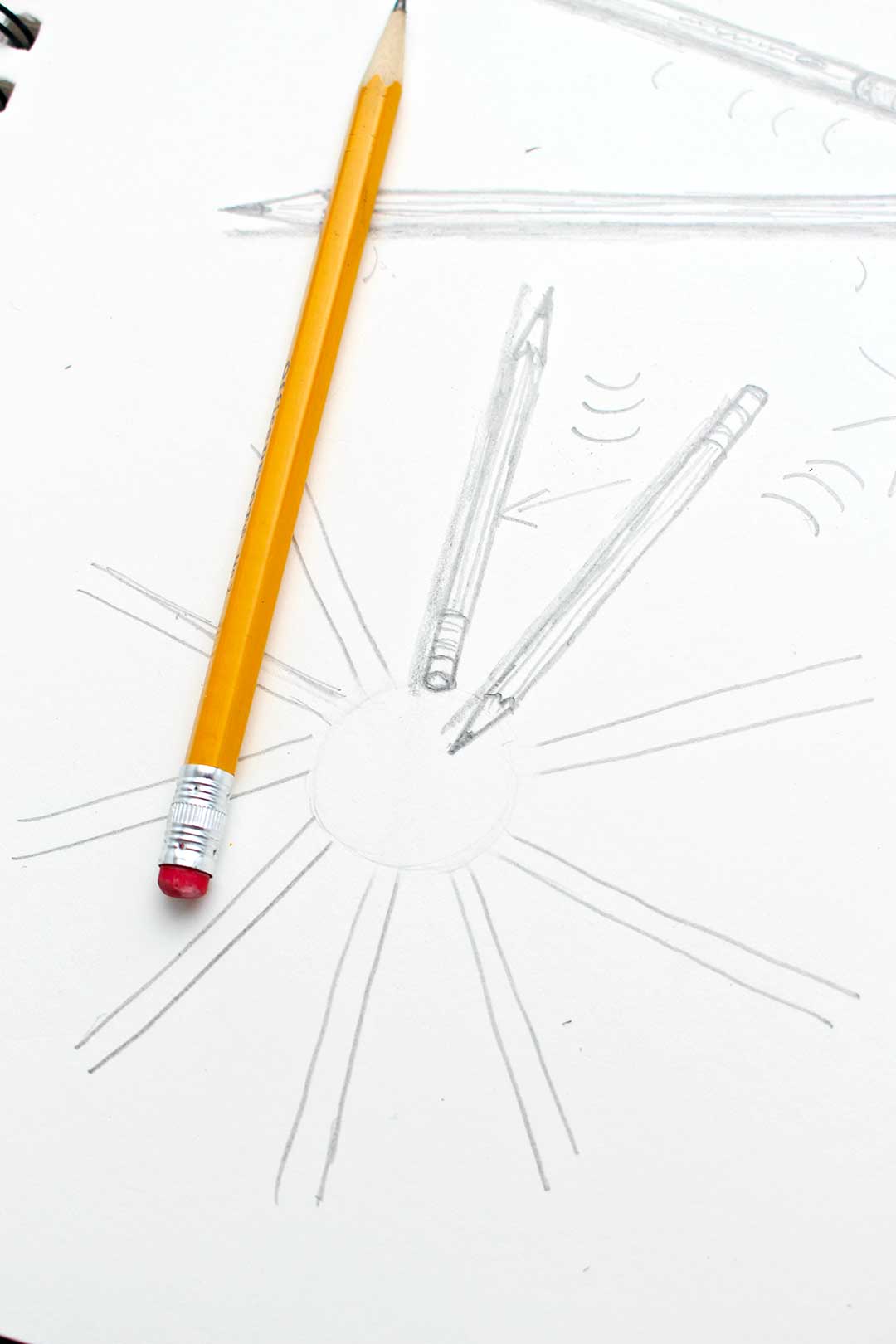 Close up view of pencils drawn in different angles and directions.