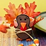 Completed Flowerpot Turkey sitting on a colorful placemat with yellow background.