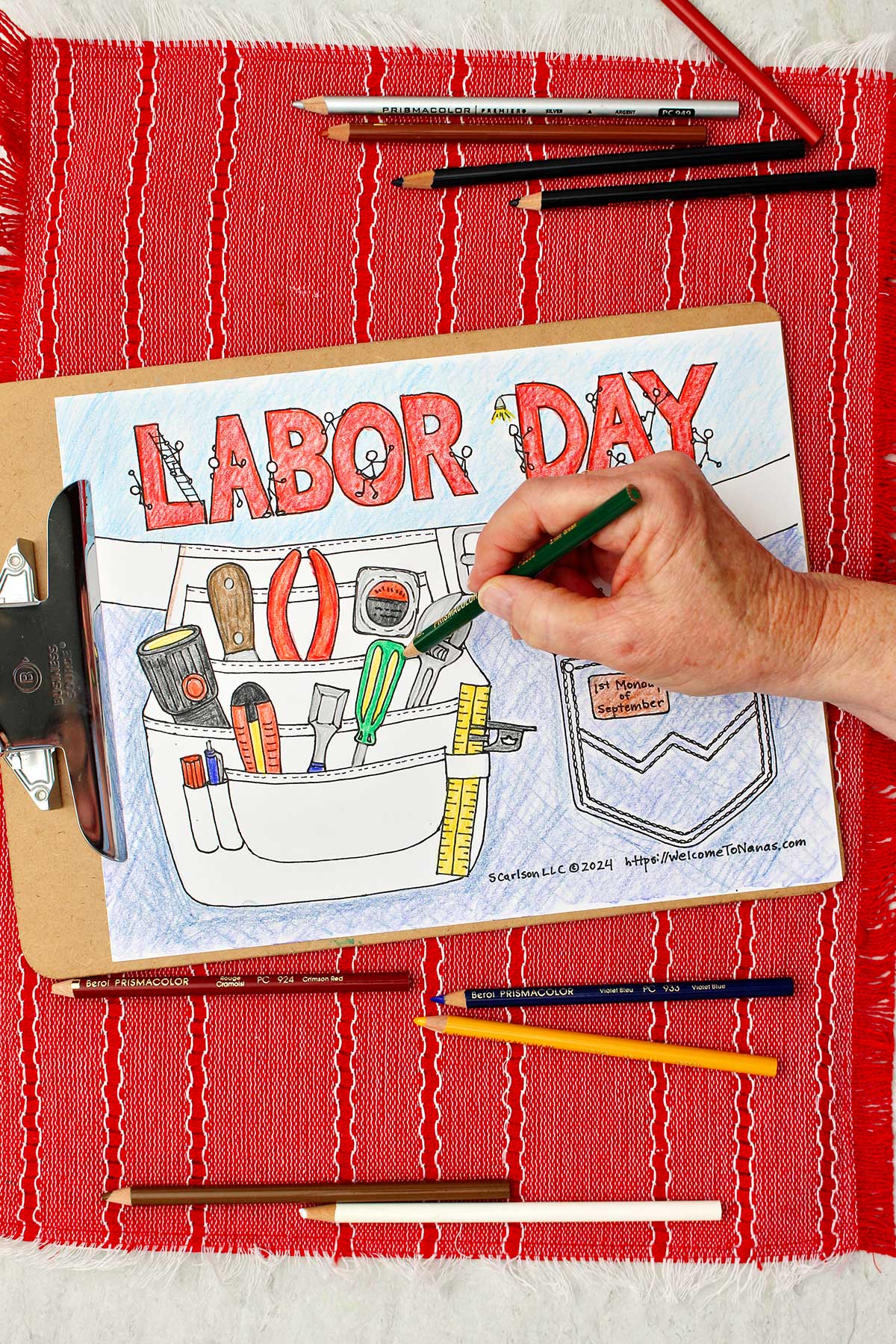 Person coloring screwdriver in tool belt green on Labor Day coloring page.