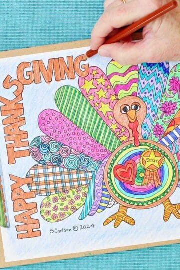 Person coloring "Happy Thanksgiving" orange on Thanksgiving coloring page for kids.