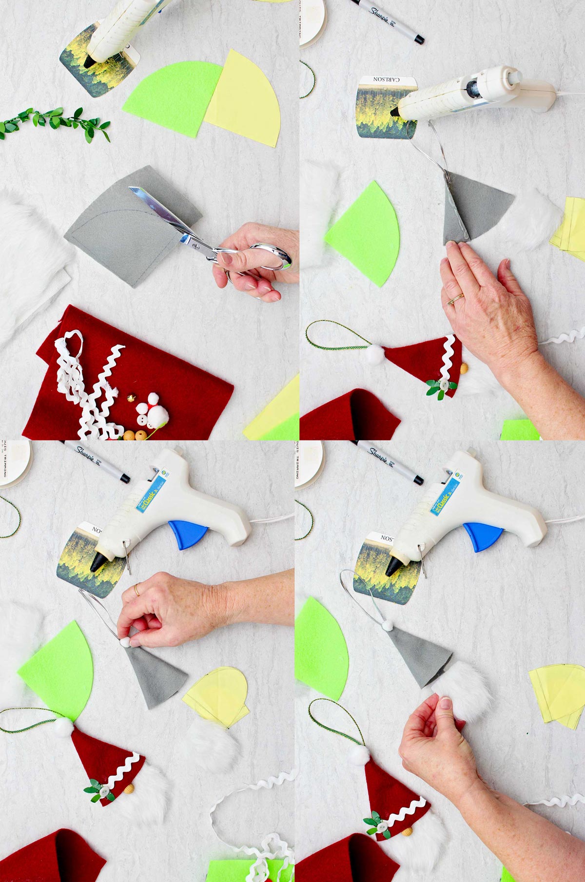 Person cutting out a piece of grey felt and forming into a hat for a gnome Christmas ornament.