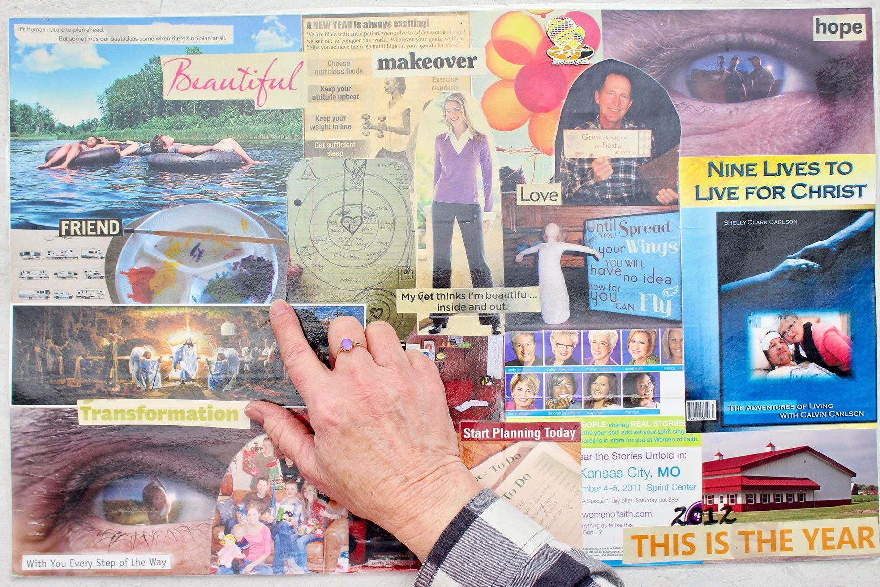 A person pointing out important photos on their vision board.