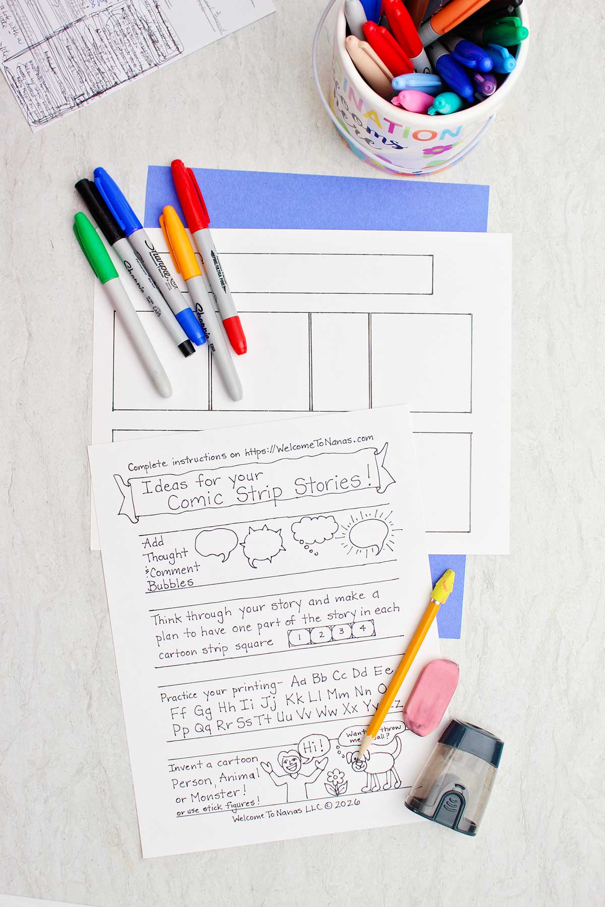 A comic strip story template and print out of ideas for your stories with sharpies, pencil and eraser near by.