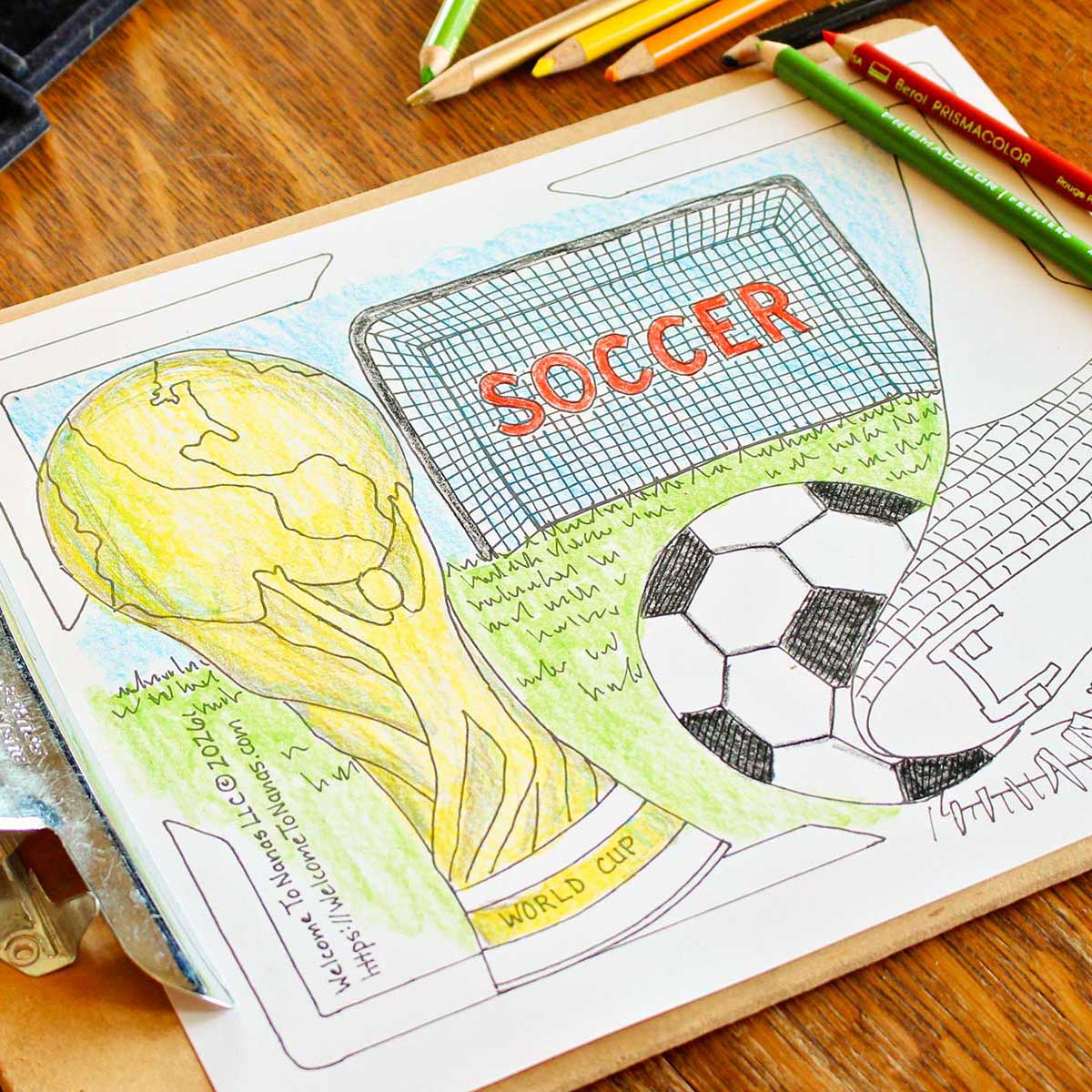 A partially colored in World Cup coloring page coloring sheet featuring a soccer ball being kicked, a soccer goal, and a FIFA World Cup trophy on a wooden table.