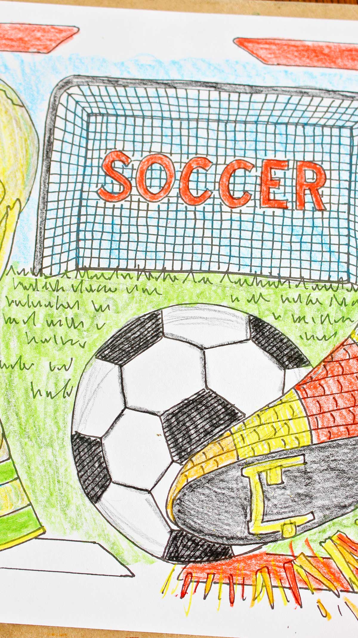 A close up of a soccer player kicking a soccer ball into a goal on a fully colored in FIFA World Cup coloring page.