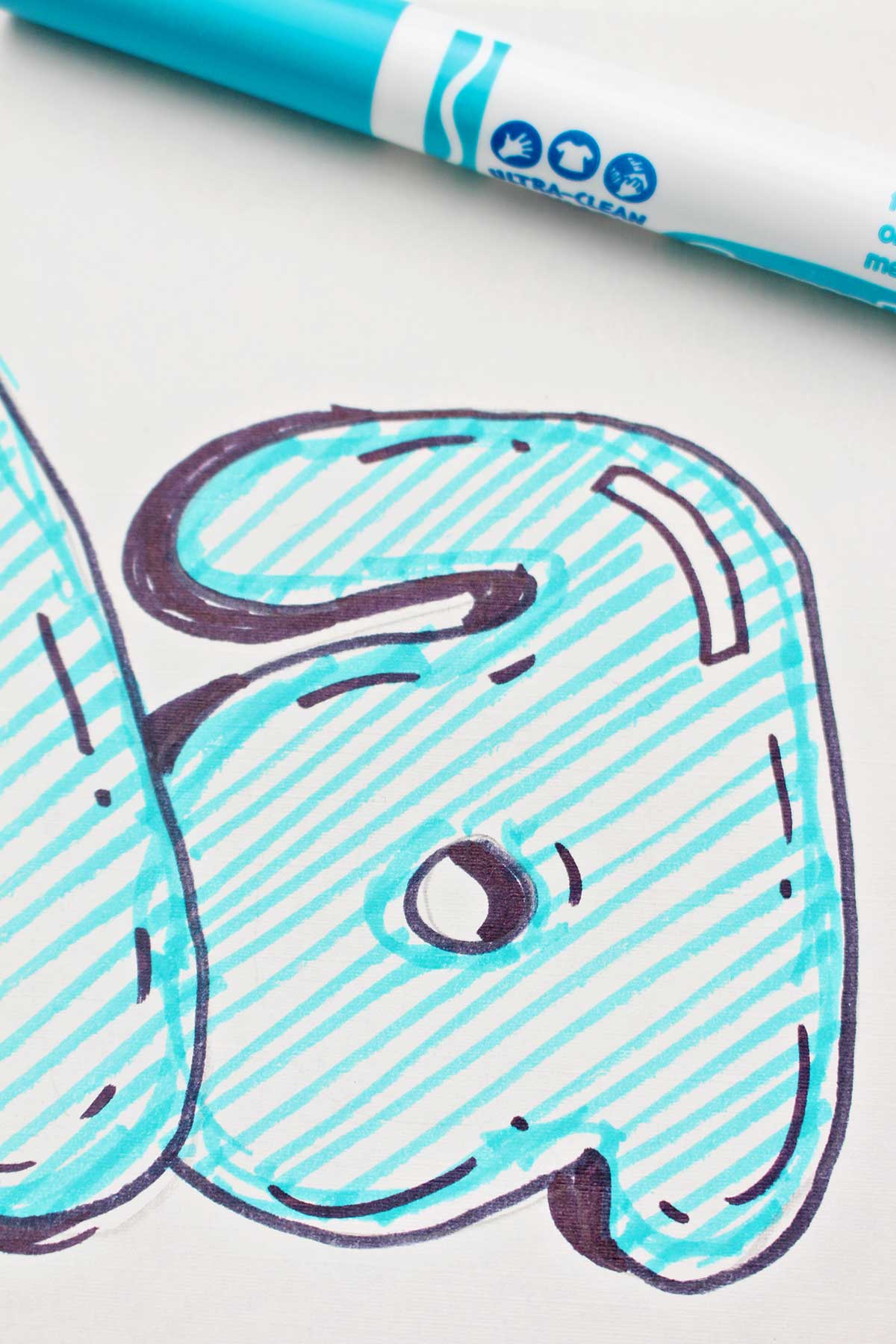 A close up of a completed bubble letter lowercase "a".