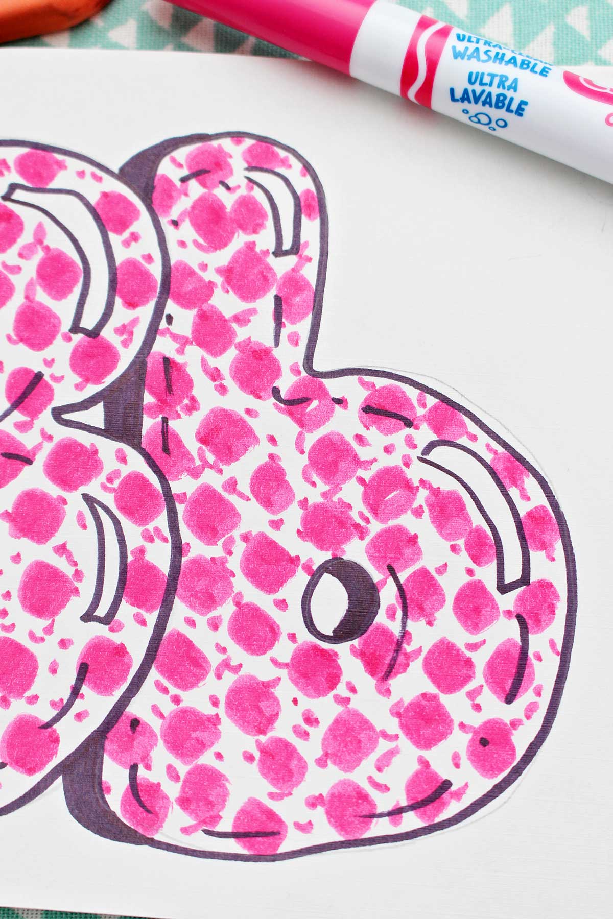 A close up of a completed bubble letter lowercase "b".
